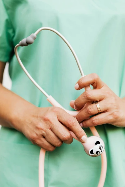 A person holding a stethoscope